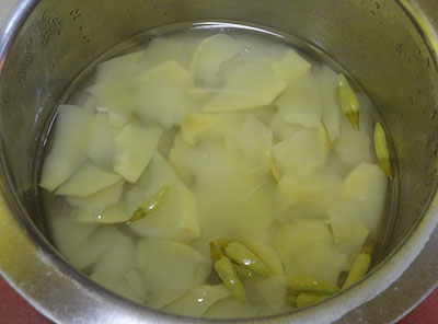 cook mango and green chilli for appe kayi saaru
