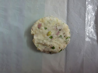 dough on plastic sheet for avarekalu akki rotti