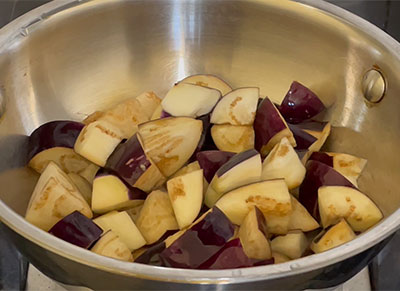 chopped brinjal for badanekayi gojju or brinjal curry recipe