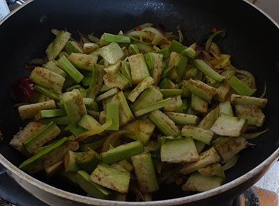 chopped brinjal for badanekayi palya or brinjal onion stir fry