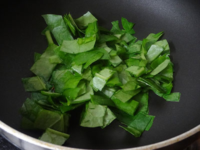 chopped leaves for basale soppu thambli or malabar spinach tambli