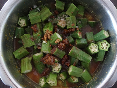 cook ladies finger for bendekai bolu huli or bendekayi bol koddel