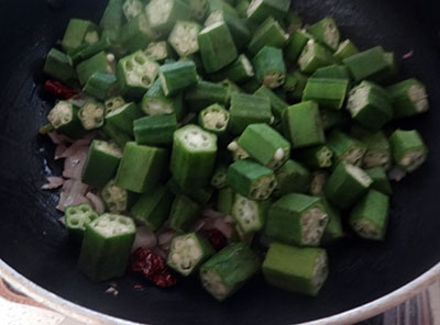 chopped okra for bendekai palya or ladies finger stir fry