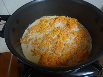 cooked carrot in a vessel for carrot halwa