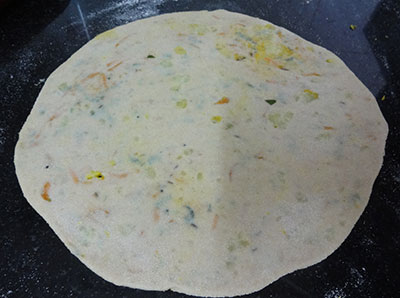rolling carrot paratha