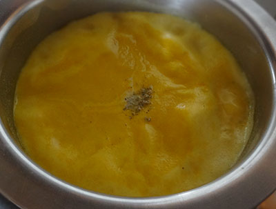 boiling carrot badami payasa or carrot badam kheer