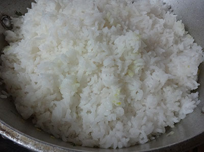 adding rice for lemon rice or chitranna