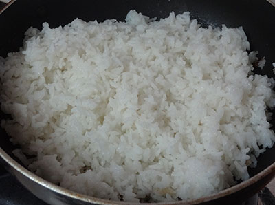 adding cooked rice for coconut rice