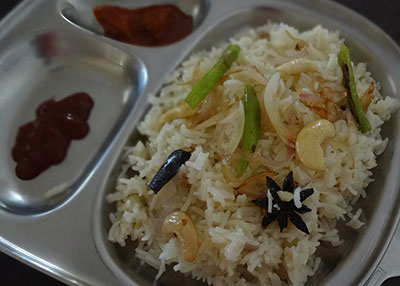 serve ghee rice with tomato sauce and pickle