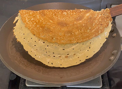 godhi hittina dosse or wheat flour rava dosa on iron pan