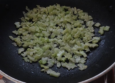 frying hagalakayi for bitter gourd chutney