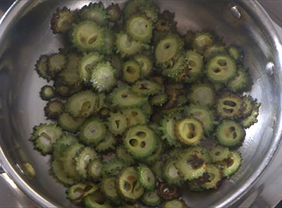 fried bitter gourd slices for hagalakayi or bitter gourd fry