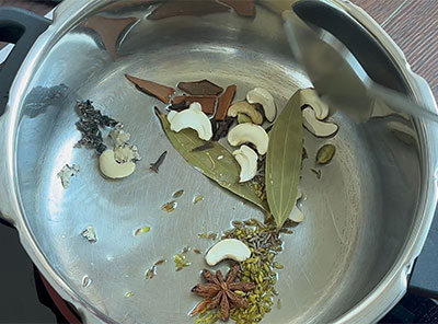 oil and spices for hasi batani pulav recipe or green peas or matar pulao