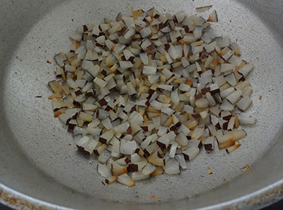 frying dry coconut for hurigalu or hurgaalu or hurigaalu
