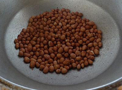 frying peanuts or ground nuts for hurigalu or hurgaalu or hurigaalu
