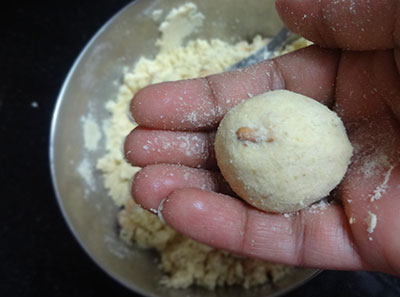 making fried gram laddu or putani undi