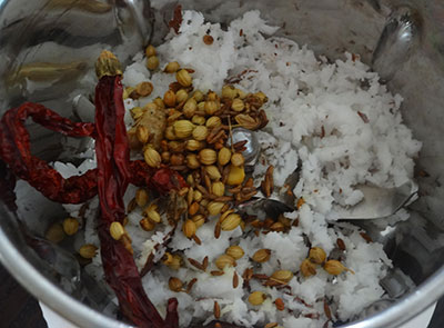 grinding coconut and spices for huruli kaalu saaru or kudu saaru or horse gram rasam