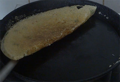 jolada dose or jowar dosa on iron pan