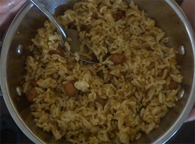 mixing curry leaves rice or karibevu soppina ricebath