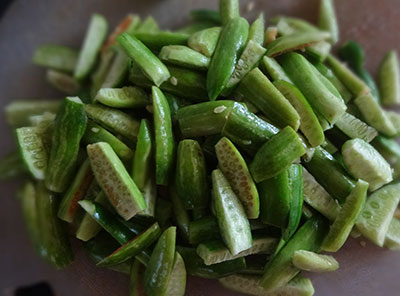 cut ivy gourd for majjige huli or kayi huli