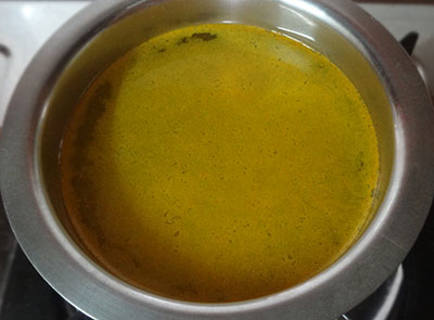 boiling water and sugar for kesari bath or rava kesari