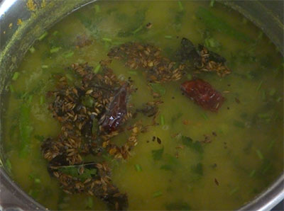 tempered nimbe hannu saaru or lemon rasam