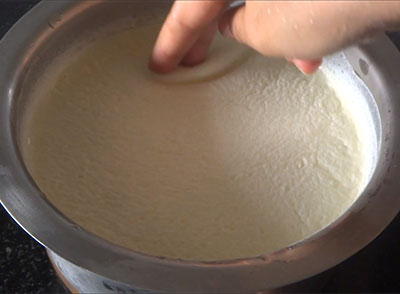 collecting cream to make butter and ghee at home
