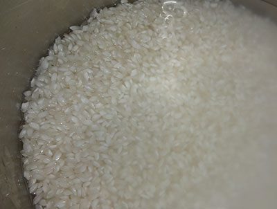 soak the rice for spicy neer dosa or masale neer dose