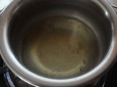 boil salt water for tender mango pickle or mavina midi uppinakayi
