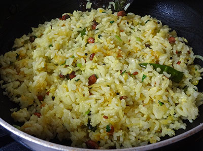 mixing mavinakai chitranna or mango rice