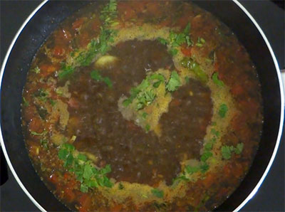 boiling menasina saaru or pepper rasam