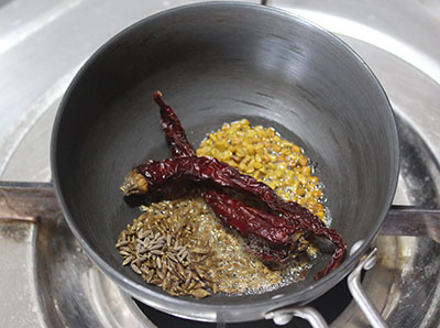 ghee, red chilli, mustard and cumin for menthe tambuli or menthya tambli