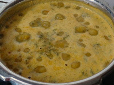 boiling mixed greens sambar or soppina huli saaru