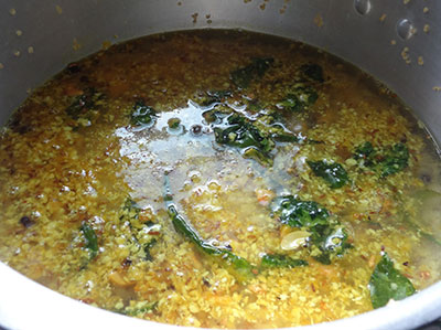 mixing navane or foxtail millet pongal