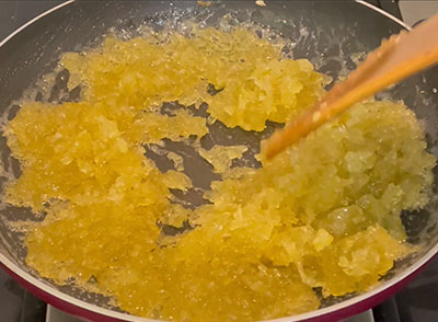 checking consistency for nellikai leha or amla jam recipe