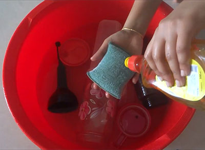 boiling tamarind pulp for how to clean oil bottle or container