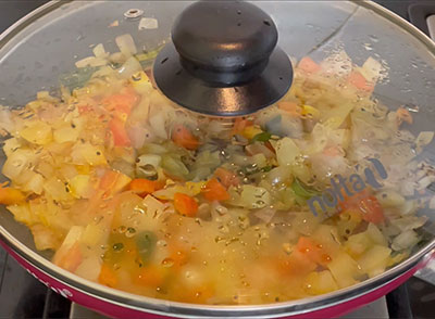 cooking tomato for Eerulli bhaji or onion gojju recipe