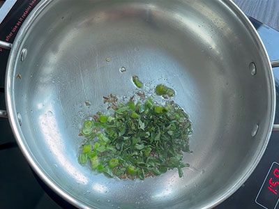 green chillies and curry leaves for onion tomato paratha or masala chapati