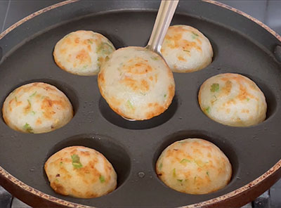 cook majjige paddu or mosaru appa recipe on both sides