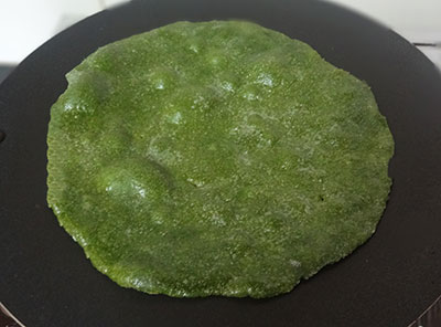 cooking palak paratha or parota