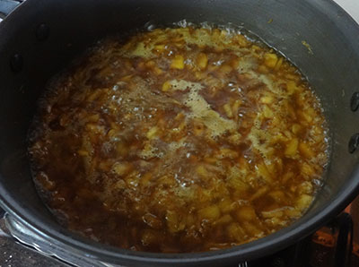 boiling pineapple and jaggery syrup for pineapple or ananas payasa