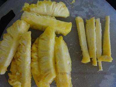 cutting pineapple for pineapple or ananas payasa