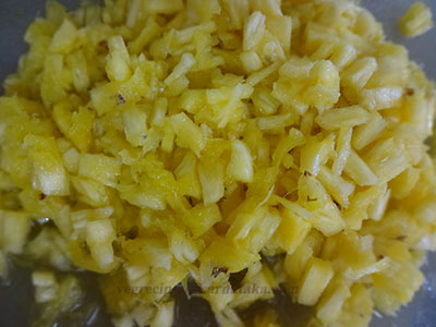 chopping pineapple for pineapple or ananas payasa
