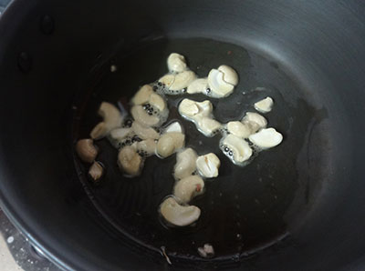 frying cashews for pineapple or ananas payasa