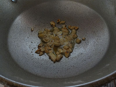 frying cashews for ragi laddu or ragi unde
