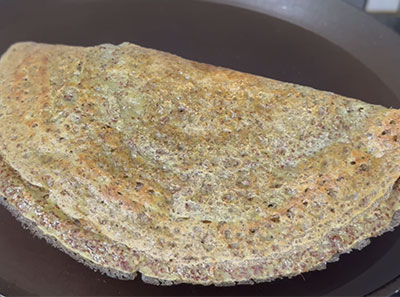 ragi hesaru kalu or mung bean dosa on pan