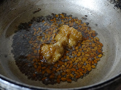 tempering for ranjaka or red chili chutney