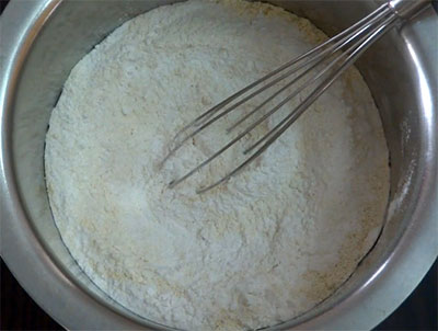 mixing flours for rava onion dosa or rava onion dose