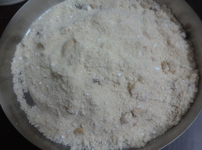 mixing ingredients for rave unde or rava laddu or suji ladoo