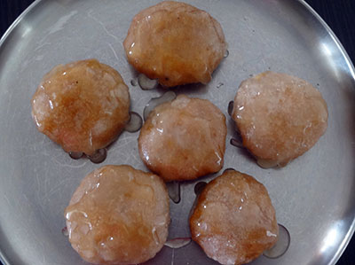 dipping saat or badusha in sugar syrup